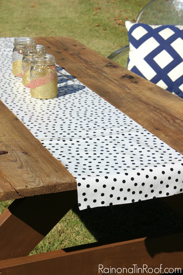 This is so cool - just add legs to an old barn door and you have an instant picnic table! How to Build a Picnic Table out of a Barn Door via RainonaTinRoof.com