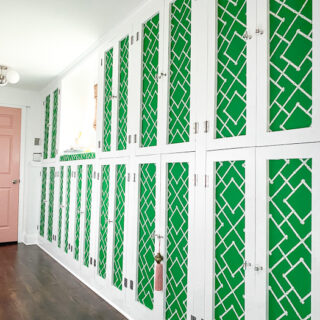 Mudroom cabinets with green and white lattice fabric panels.