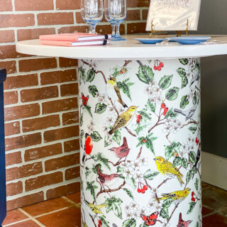 how to decoupage a table with wallpaper - bird wallpaper applied to base of white table